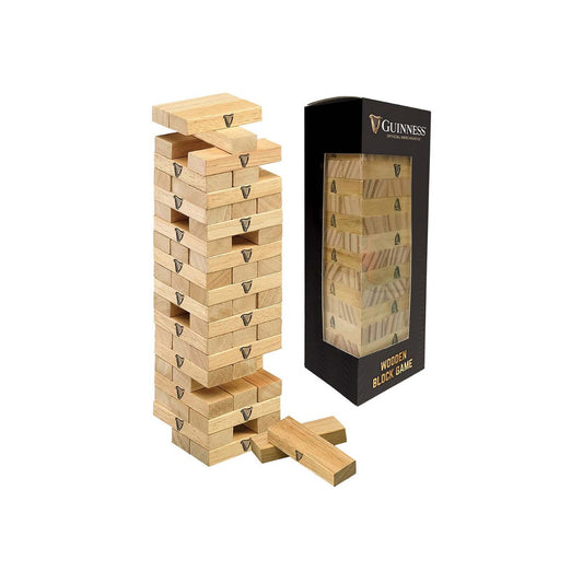 A Guinness wooden tower with a game box next to it.