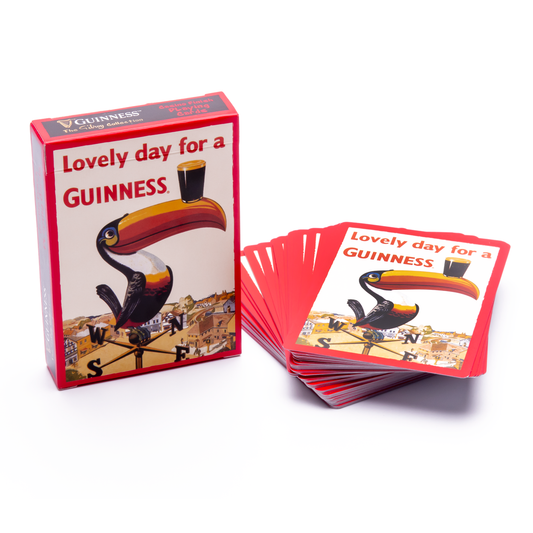 A deck of Guinness Toucan Playing Cards with a vintage advertisement design featuring Gilroy the Toucan.
