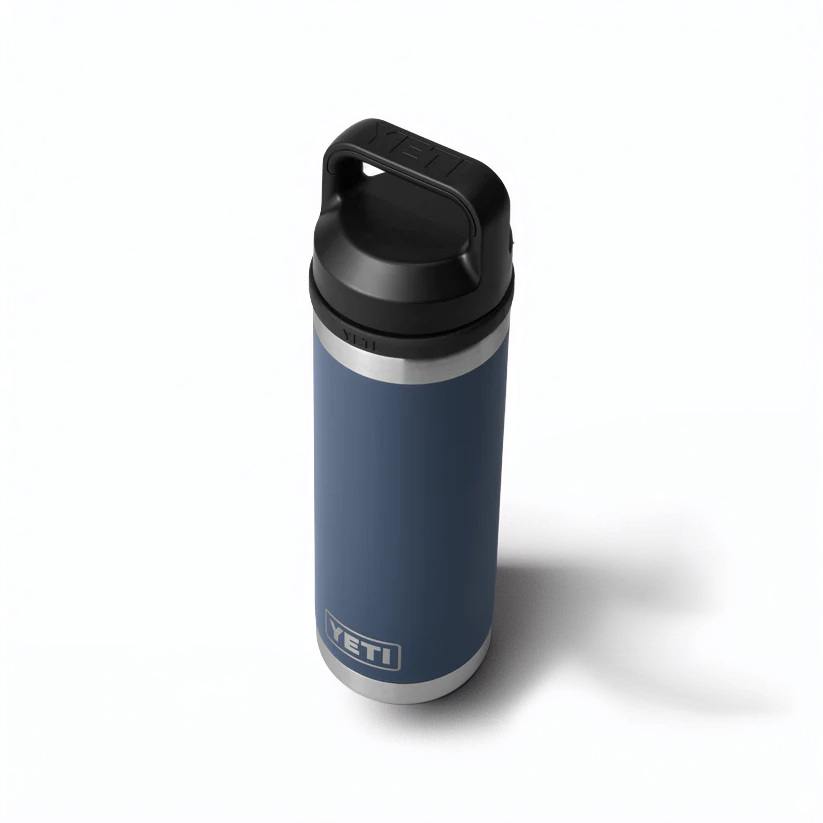 A navy Guinness Six Nations YETI 18oz Chug Bottle with a black lid from Guinness Webstore UK stands upright on a white surface—ideal for rugby fans preparing for the next big match.