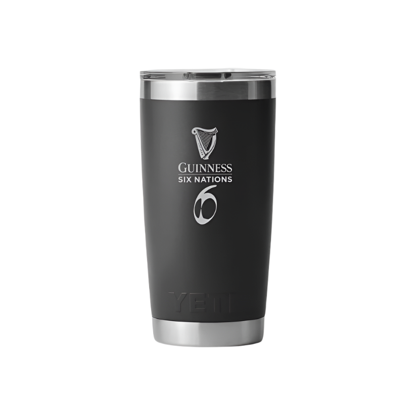 The Guinness Six Nations - Yeti 20oz Tumbler BLACK from Guinness Webstore UK showcases the "Guinness Six Nations" and number 6 logo—perfect for rugby fans. The embossed "YETI" brand name at the bottom adds a premium touch.