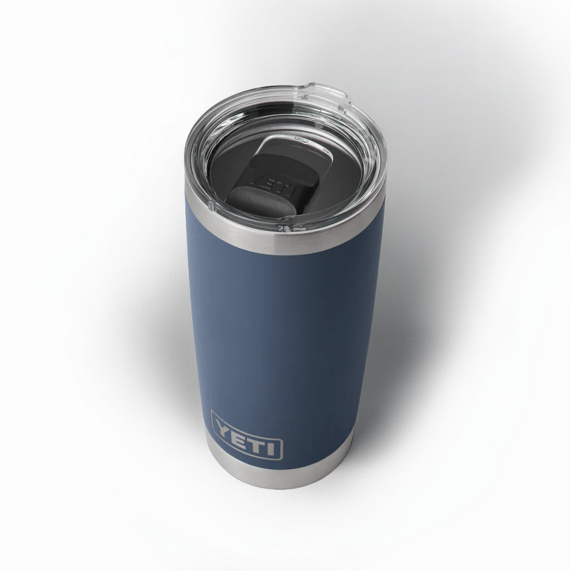 The Guinness Six Nations Yeti 20oz Tumbler in navy, from Guinness Webstore UK, features a spill-resistant transparent lid and stands upright on a white surface—perfect for rugby fans or as official Six Nations merchandise.