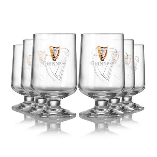 Six Guinness Embossed Stem Glasses 420ml - 6 Pack, each with a Harp logo and delicate stem, displayed on a clean white background. (Brand Name: Guinness UK)