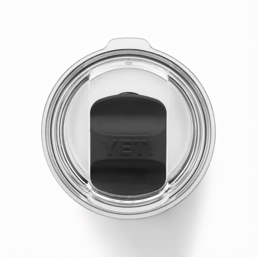 Top-down view of a transparent lid with a black magnetic slider labeled "YETI" on the GREEN Guinness Six Nations Yeti 20oz Tumbler from Guinness Webstore UK, shown against a white background.