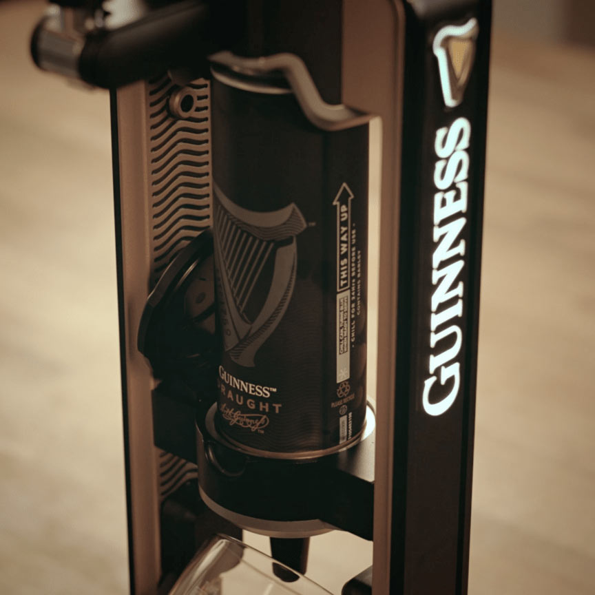 A can of Guinness MicroDraught® placed in a Guinness UK® MicroDraught machine, perfect for your home bar setup.