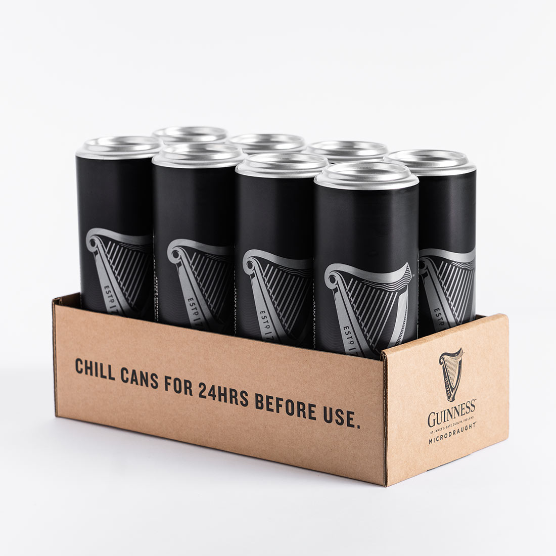 Six Guinness MicroDraught Stout Beer Cans from Guinness UK in a cardboard box.