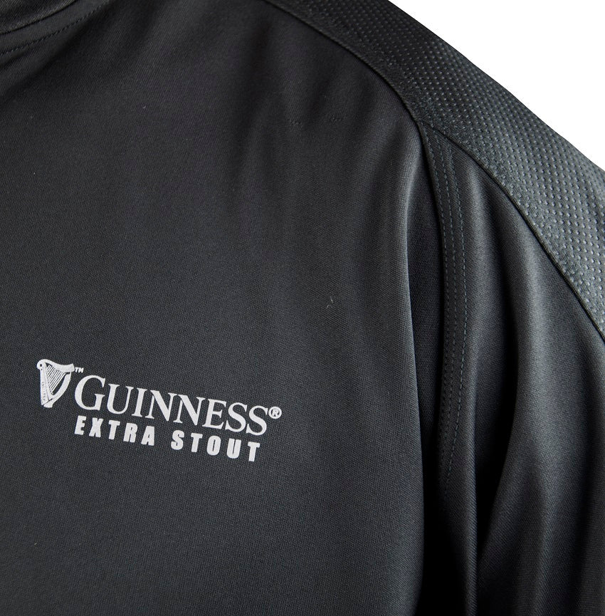 Guinness All Black Rugby Jacket with moisture-wicking jersey in black. Featuring Guinness branding.