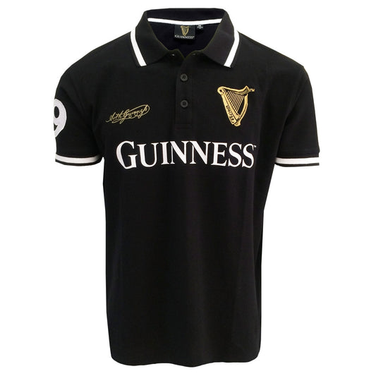 A black and gold Guinness UK polo shirt made from a cotton blend.