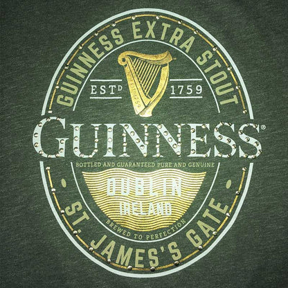 Guinness Stud Label T-shirt design featuring the logo of Guinness Extra Stout with text, harp emblem, and establishment details on a grey background.