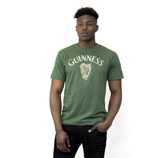 A man wearing a vintage Guinness UK t-shirt.