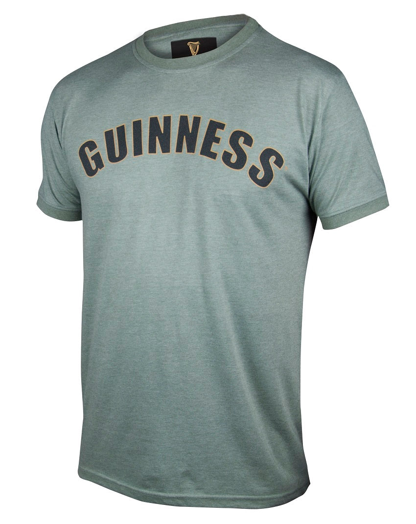 This Green Heathered Bottle Cap T-Shirt by Guinness features a green Guinness heathered bottle cap design on a cotton blend fabric.
