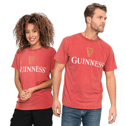 Man and woman wearing premium Guinness UK Harp Red T-shirts.