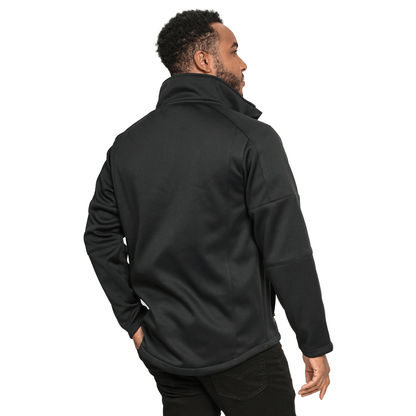 The back view of a man wearing a Guinness UK Waterproof Jacket.