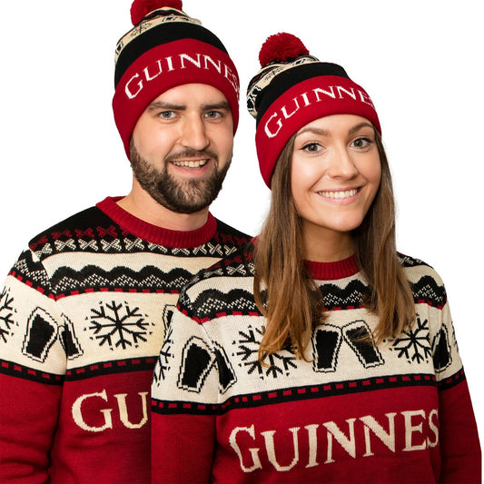 Two people wearing Guinness UK Official Pint Winter Beanie sweaters and winter beanie hats.