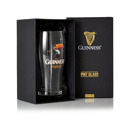 A Guinness UK Toucan Pint Glass, featuring the iconic Toucan design, packaged in a box.