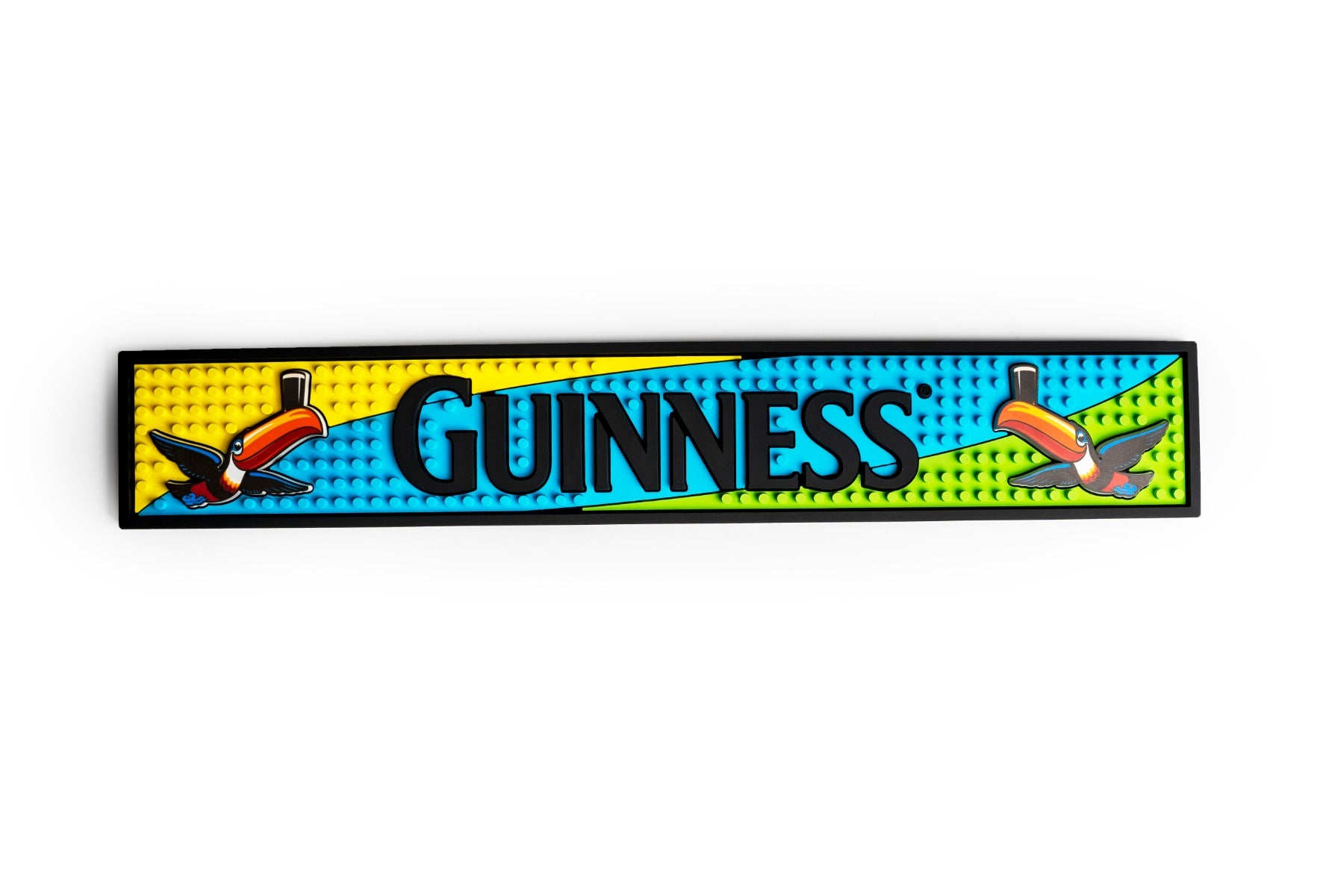 Guinness UK Guinness TOUCAN PVC BAR MAT with a black background, perfect for creating a pub-feel in your home bar.