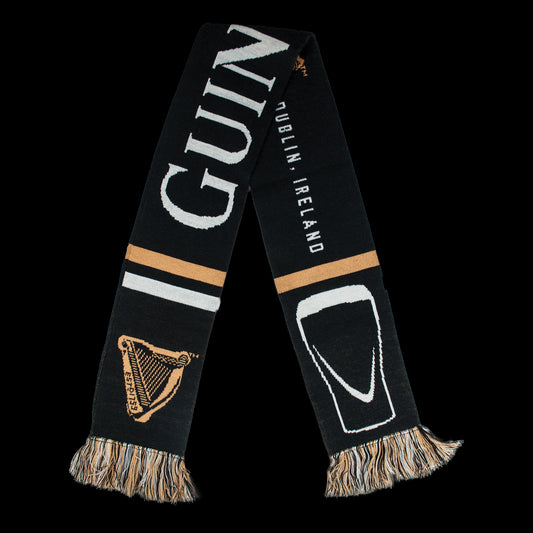 A black and white sports Guinness Scarf with the words Guinness and a harp logo.
