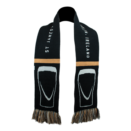 A black sports scarf with the word "St Bernard" and the Guinness logo on it would be a Guinness Scarf.