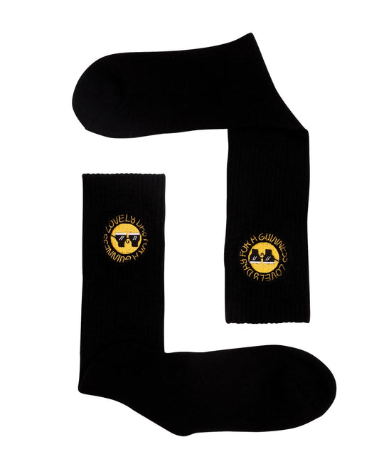 Stylish FATTI BURKE "LOVELY DAY FOR A GUINNESS" black socks with a smiley face, both comfortable and fashionable from Guinness Webstore UK.