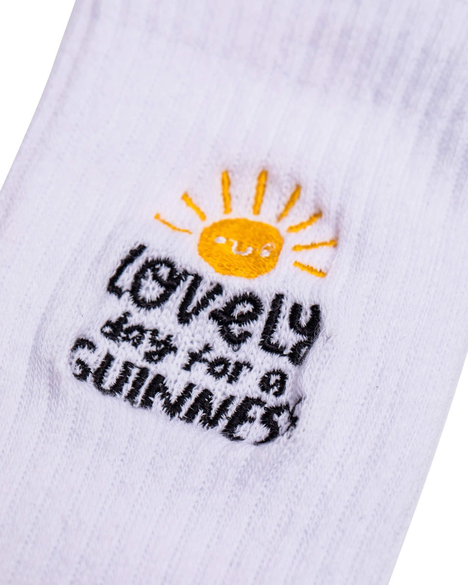 A FATTI BURKE "LOVELY DAY FOR A GUINNESS" white sock from Guinness Webstore UK.