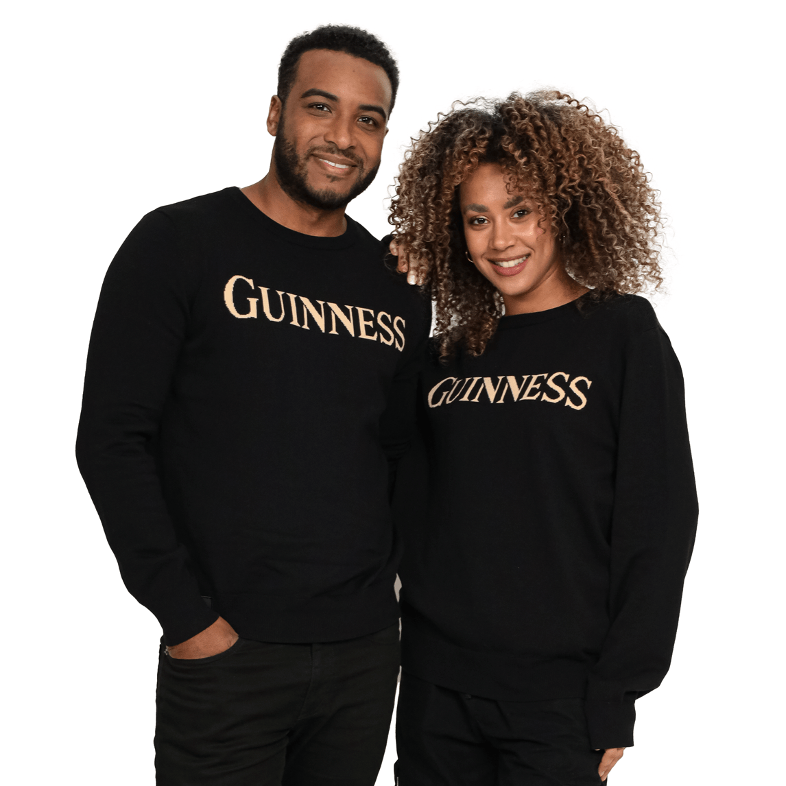 A couple dressed in matching black 100% Organic Cotton Jumpers adorned with the iconic Guinness UK logo.