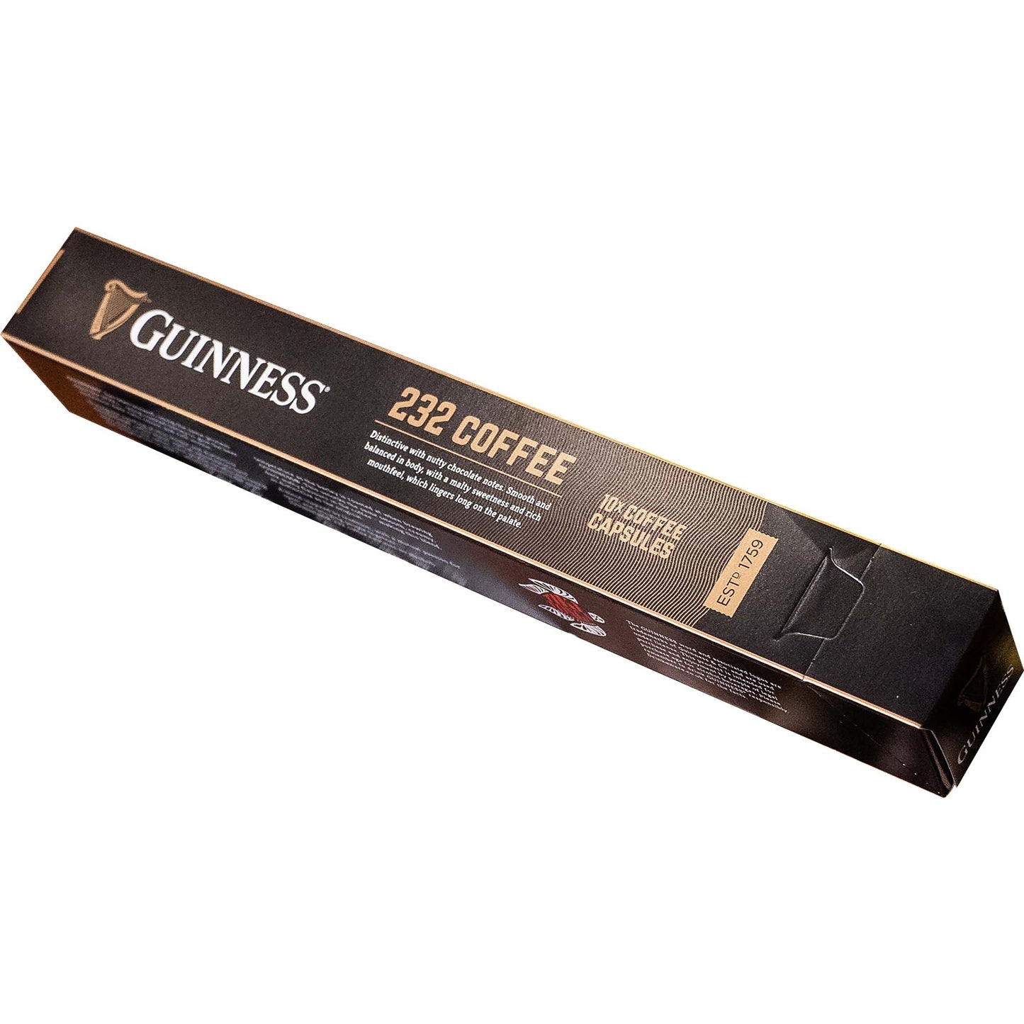 Guinness UK's Guinness 232 Coffee Capsules, featuring the renowned Guinness flavor, are packaged in a convenient box. The product is showcased beautifully against a clean, white background.