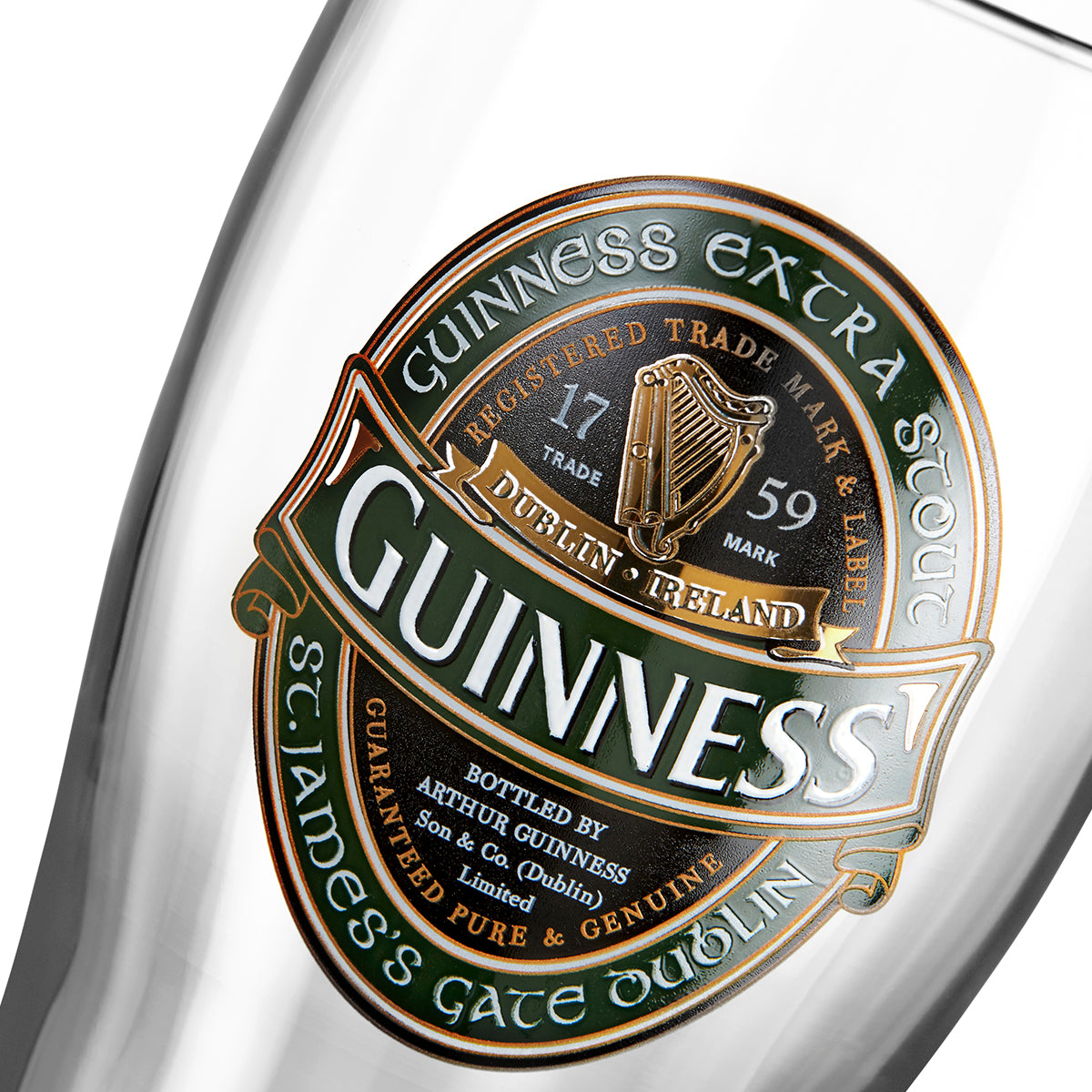An Guinness Ireland Collection pint glass featuring Guinness UK, on a white background.