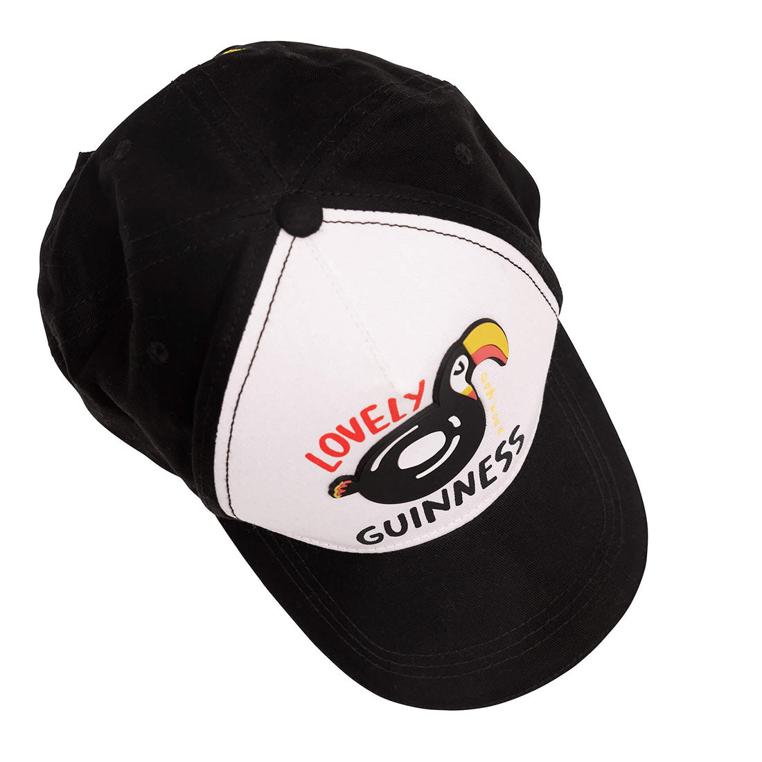 A black and white Guinness Webstore UK Toucan Cap with FATTI BURKE "LOVELY DAY FOR A GUINNESS" design.
