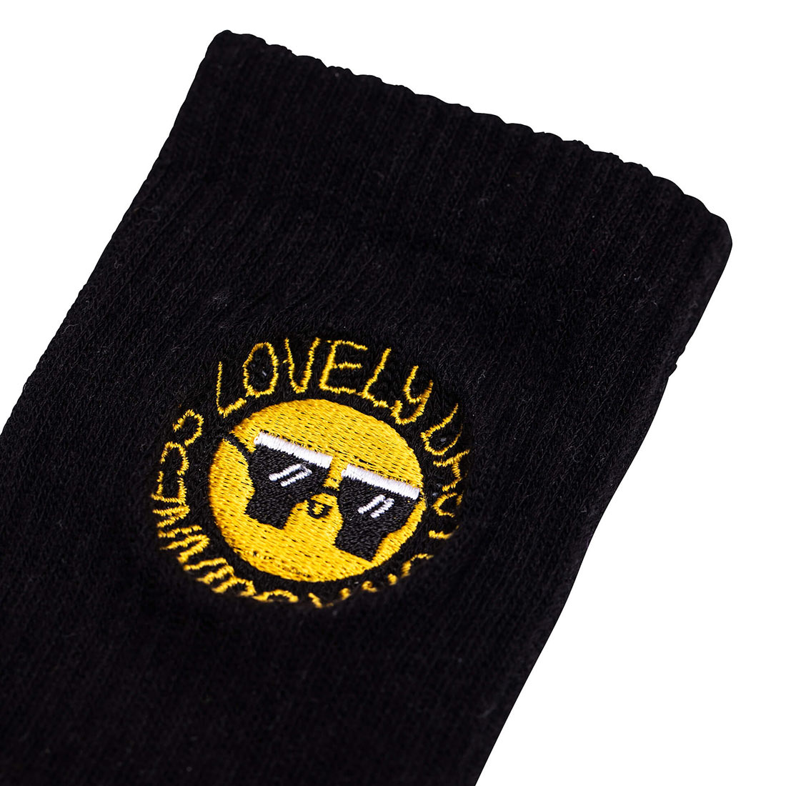 A comfortable and stylish FATTI BURKE "LOVELY DAY FOR A GUINNESS" black sock with a smiley face on it. (Brand Name: Guinness Webstore UK)