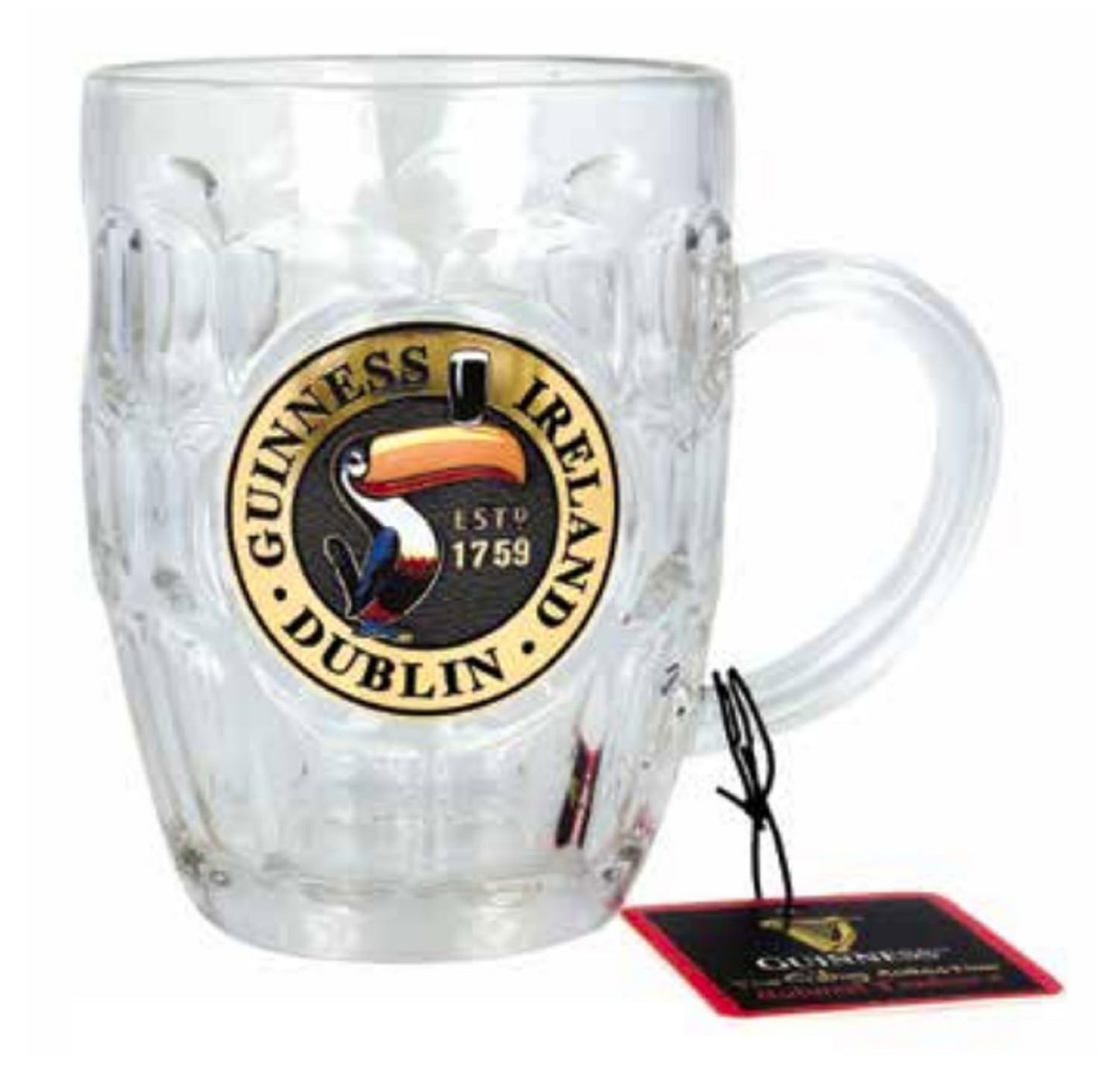 The Guinness Toucan Dimpled Tankard, available from the Guinness Webstore UK, is a clear glass mug adorned with the iconic Dublin logo and classic Guinness Toucan. It mirrors the treasured dimpled tankard of an Irishman and features a red tag attached to its handle for a unique touch.