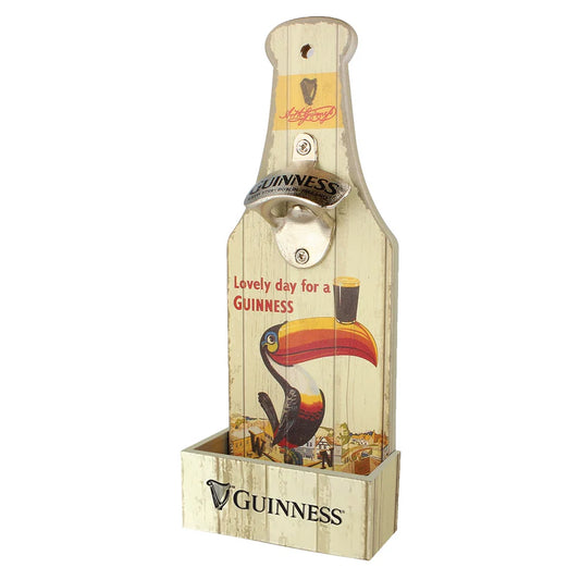 Introducing the Guinness Toucan Bottle Opener & Catcher by Guinness Webstore UK, which showcases a timeless vintage Guinness advertisement with the renowned Gilroy toucan illustration and the phrase "Lovely day for a Guinness." Ideal for enhancing your home bar, this piece adds unique character and charm to any gathering space.