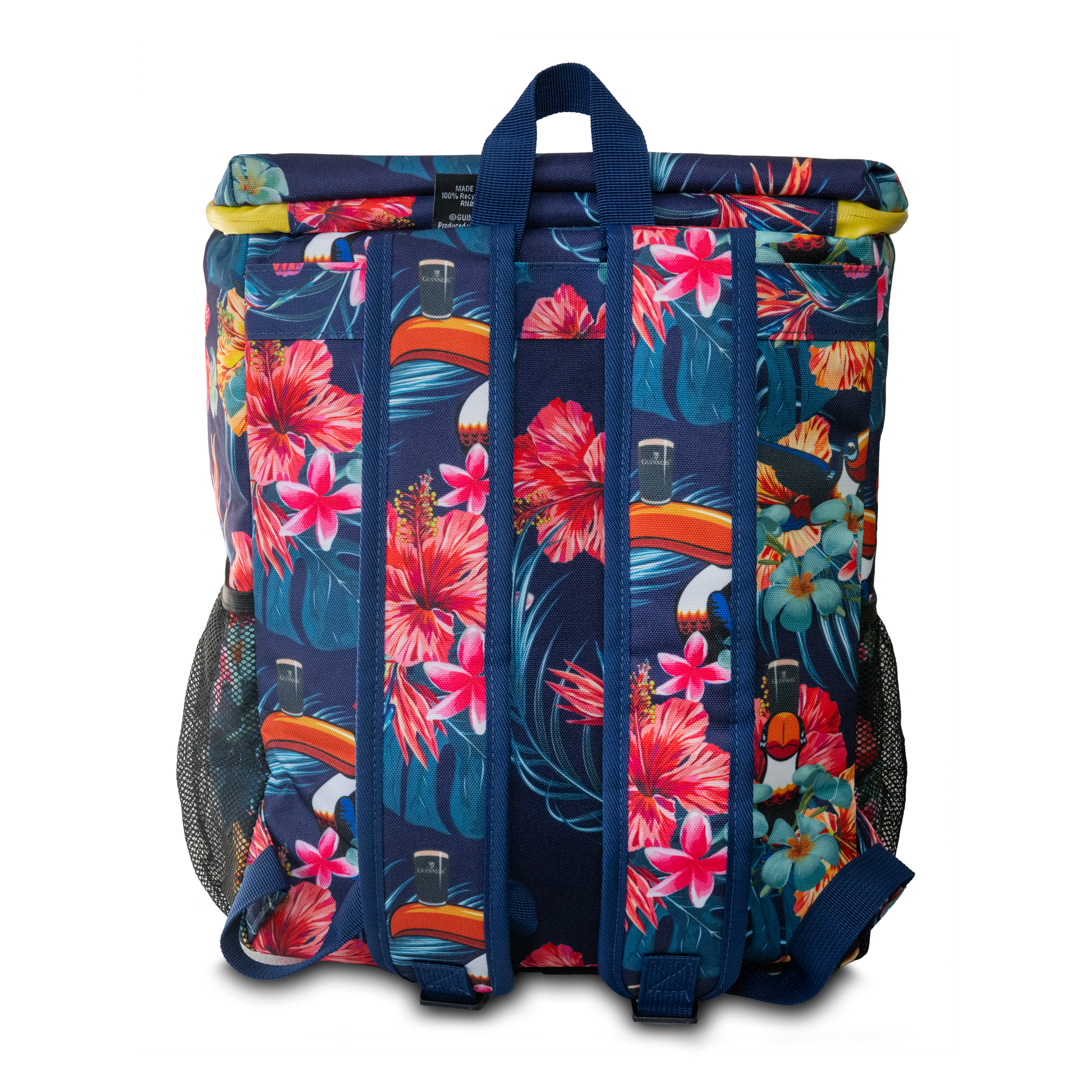 Introducing the Guinness Toucan Hawaiian Cooler Bag by Guinness Webstore UK: a vibrant cooler bag adorned with tropical floral and leaf patterns. It features blue straps and black mesh side pockets, making it the perfect companion for a day out.