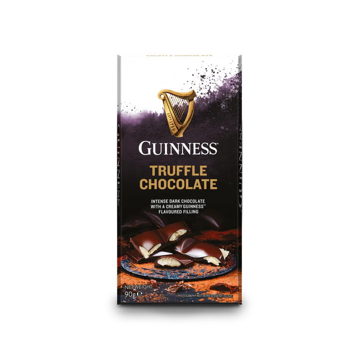 Explore the Guinness Luxury Truffle Chocolate Bar, a highlight of the Guinness Official Merchandise collection. This beautifully crafted packaging contains a dark milk chocolate bar with a rich and creamy Guinness-flavored truffle center, ideal for anyone who relishes unique and indulgent delights.