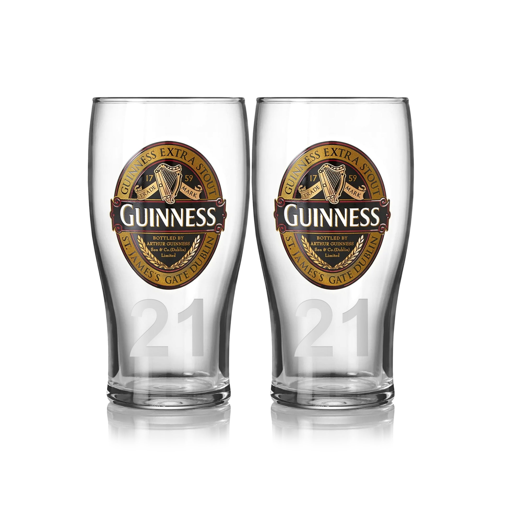 A 2-pack of pint glasses from Guinness UK, featuring the iconic logo and "21," embodies the timeless charm of the Guinness Classic Collection.
