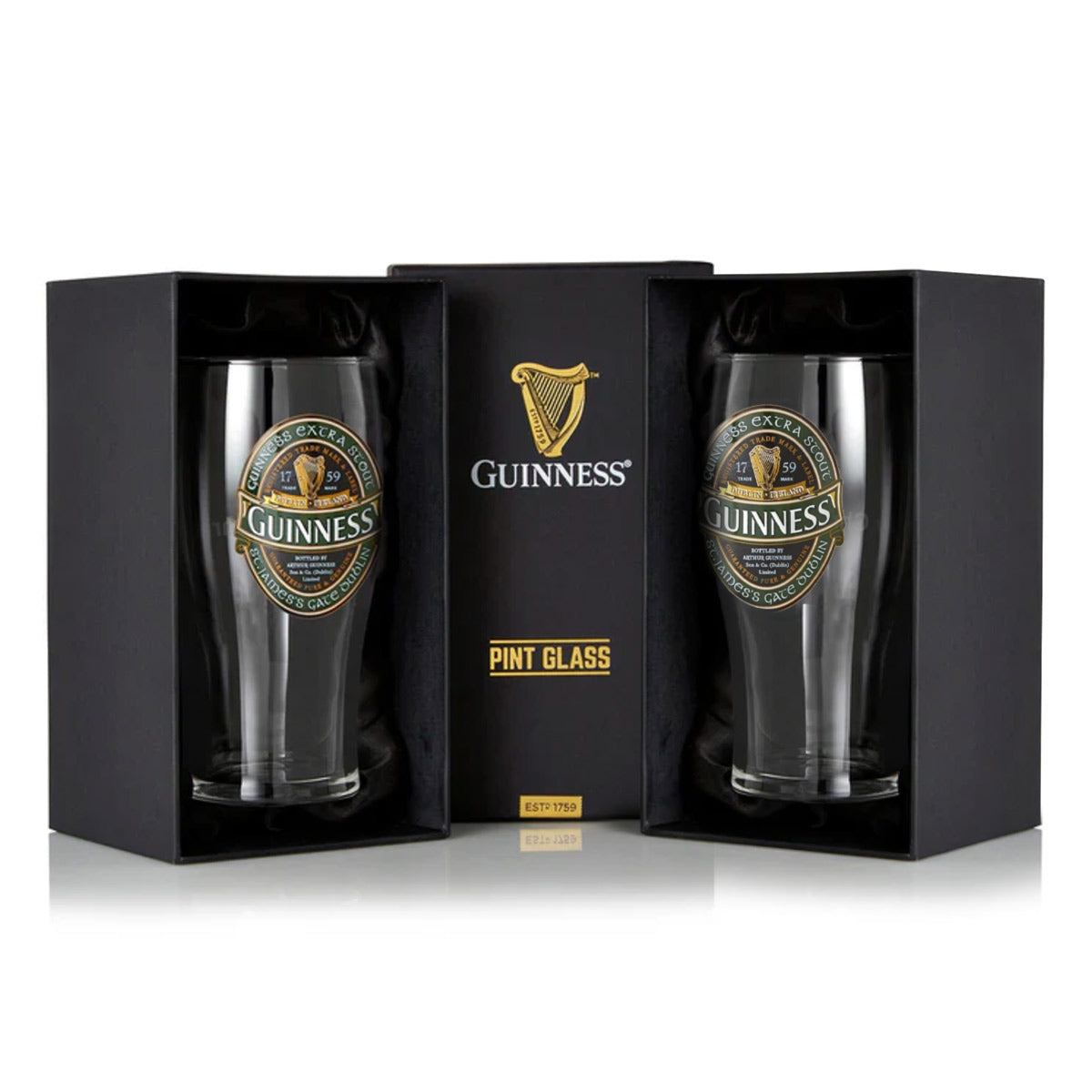 The Guinness Ireland Collection Pint Glass - 2 Pack features two glasses elegantly presented in black boxes with gold and green logo detailing.