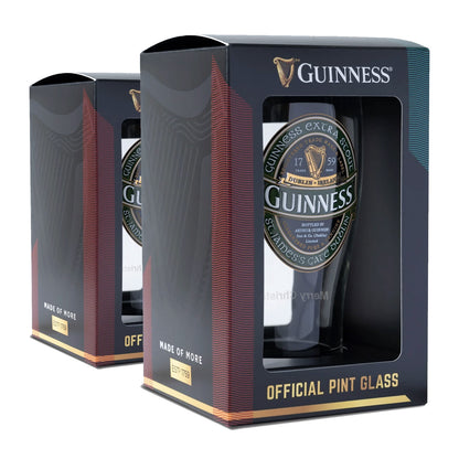 The Guinness Ireland Collection Pint Glass 2-Pack by Guinness comes elegantly encased in decorative black packaging with gold and white accents.