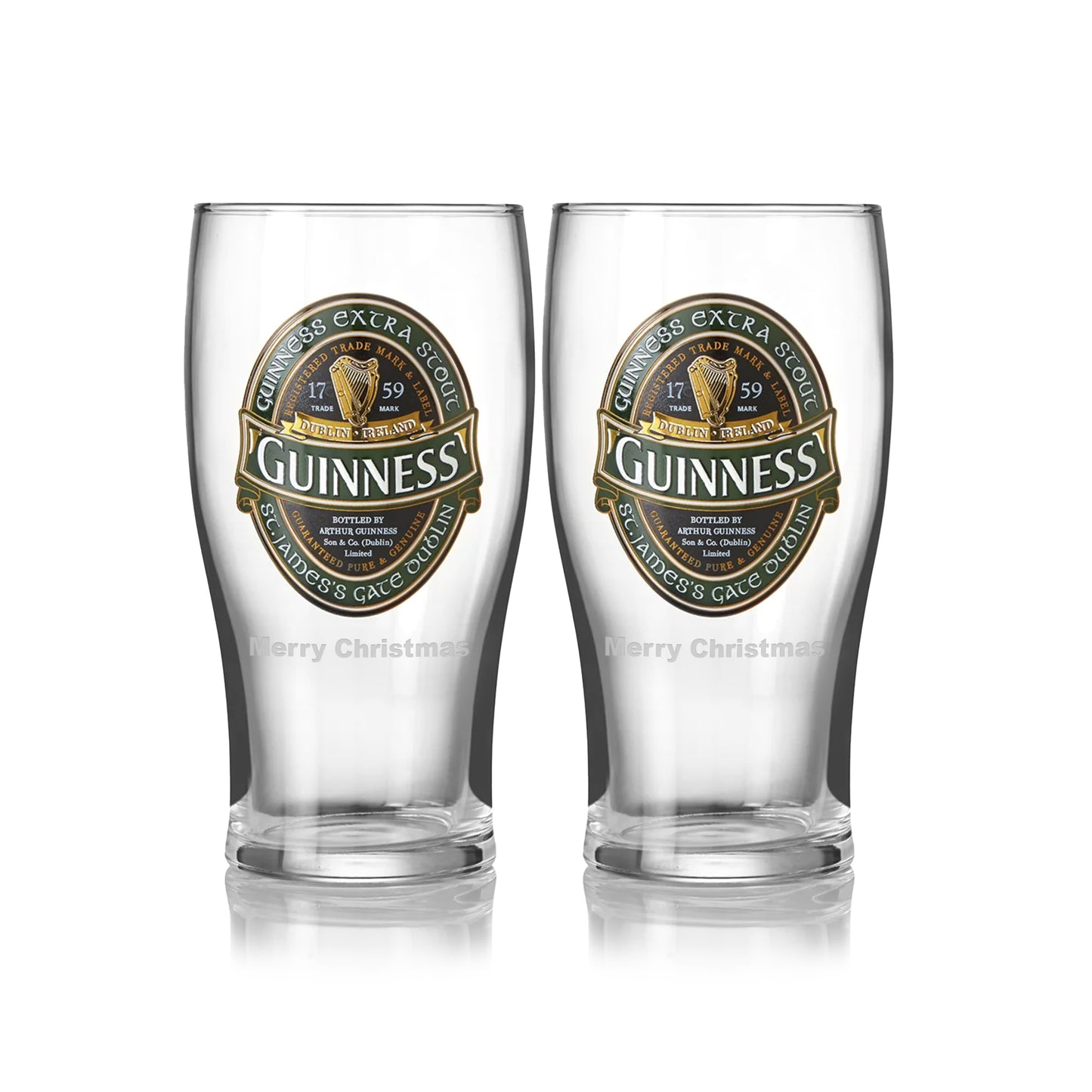 The Guinness Ireland Collection Pint Glass - 2 Pack includes two empty glasses featuring the Guinness logo and "Merry Christmas" at the bottom.