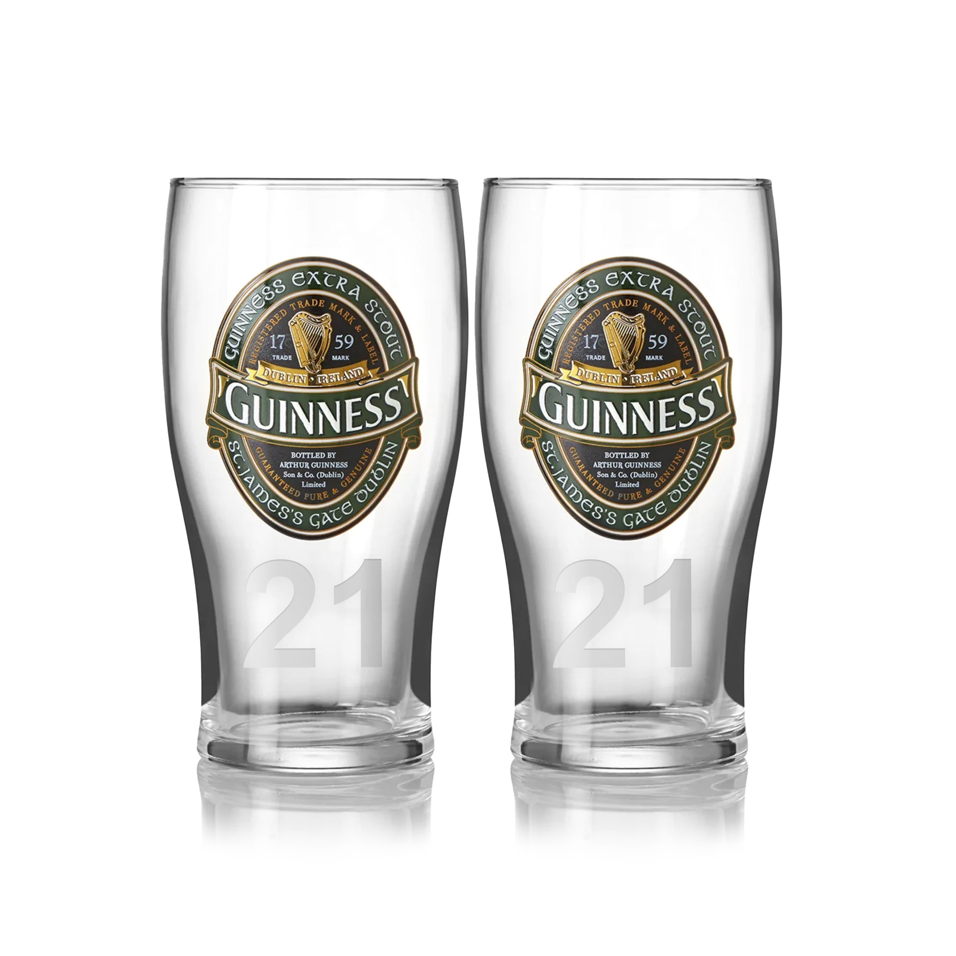 The Guinness Ireland Collection Pint Glass 2-Pack features two pint glasses with the iconic logo and branding, plus the number 21 near the base. Ideal for enjoying your favorite Extra Stout from this exclusive Guinness collection.