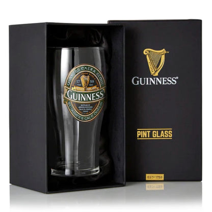 The Guinness Ireland Collection Pint Glass is elegantly presented in an open black box, featuring the iconic Guinness logo and the distinguished Extra Stout label on the front.