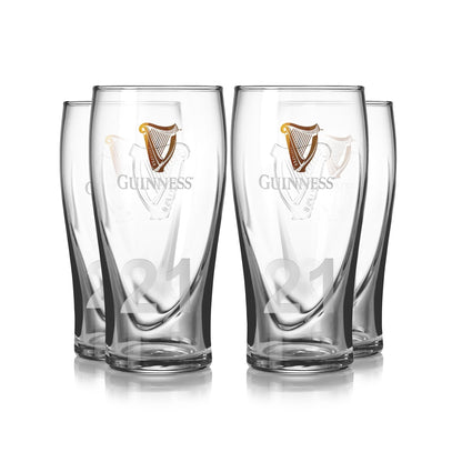 The Guinness Pint Glass - 4 Pack by Guinness UK features four branded pints with the iconic logo and "21" embossed on them, arranged in two neat rows, making it an ideal home bar gift.