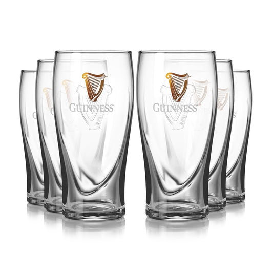 Six Guinness UK pint glasses in a multipack on a white background.