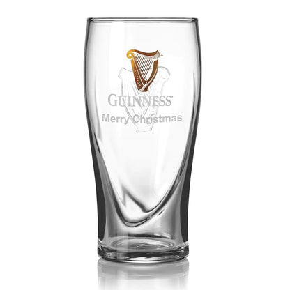 Guinness Pint Glass by Guinness features the iconic gold and white Harp logo along with "Merry Christmas" on the front, making this official merchandise a festive addition to any collection.