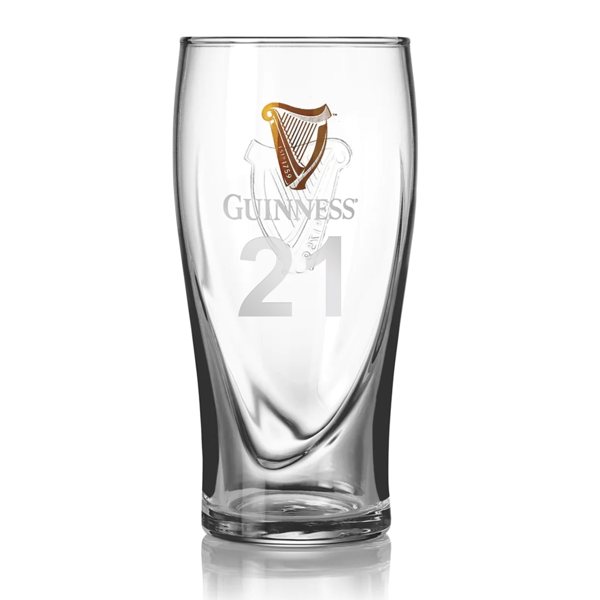 Official Merchandise: This clear Guinness Pint Glass showcases the iconic gold harp logo with the number 21 elegantly etched below.