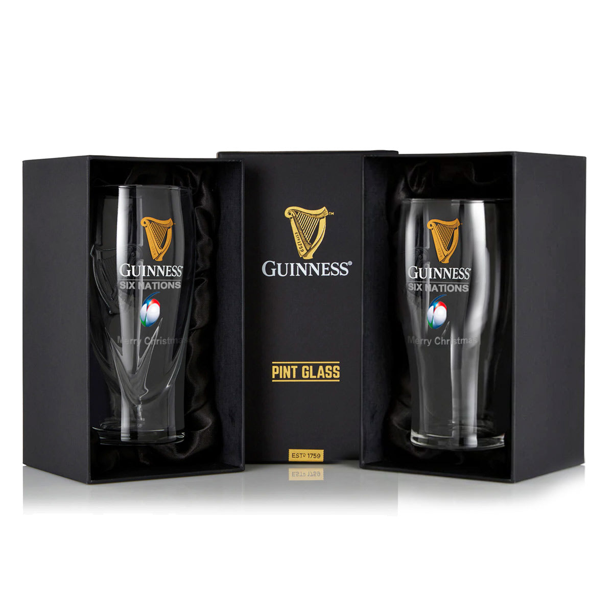 The Guinness Six Nations Pint Glass - 2 Pack by Guinness includes two stylish logo-engraved glasses presented in sleek black gift boxes with a central label, perfect for rugby fans seeking a blend of style and function.