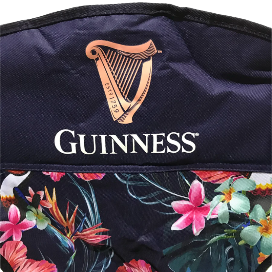 Guinness Webstore UK's collection now includes a fabric with a harp logo and vibrant floral designs, reminiscent of the charm found in the Guinness Toucan Hawaiian Beach Chair.