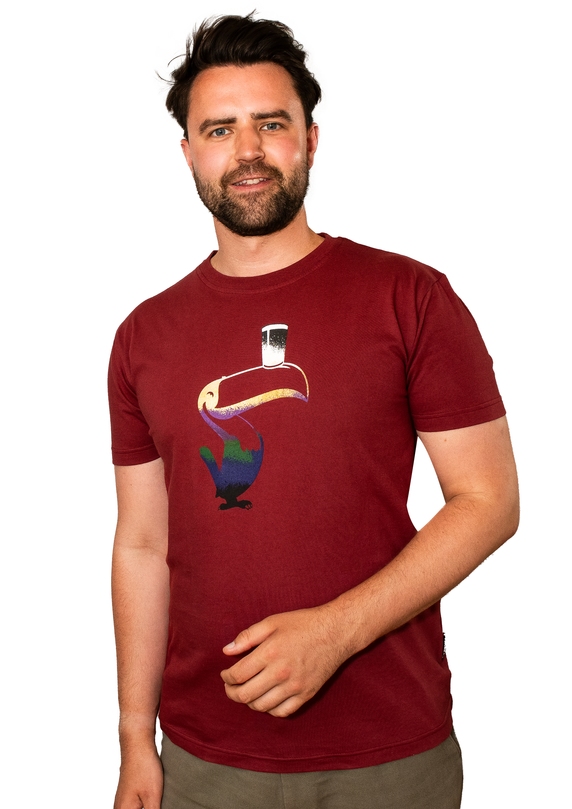 A man wearing a Guinness Liquid Toucan T-Shirt - Red with a bird on it.