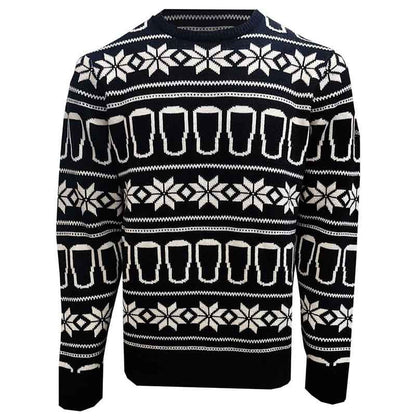 The Guinness Festive Pints Christmas Jumper by Guinness UK, featuring black fabric adorned with white geometric patterns of snowflakes and pint glasses, perfectly embodies the spirit of holiday cheer, making it ideal for enjoying festive pints during the season.