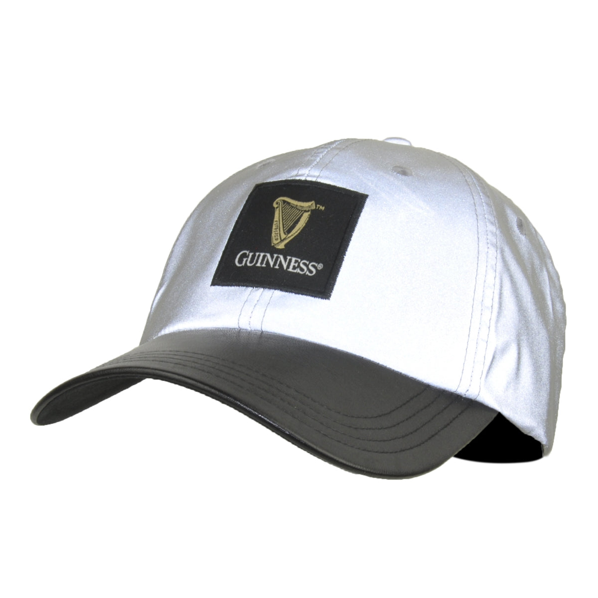 Silver baseball cap with a black brim featuring a reflective Guinness UK logo patch on the front.