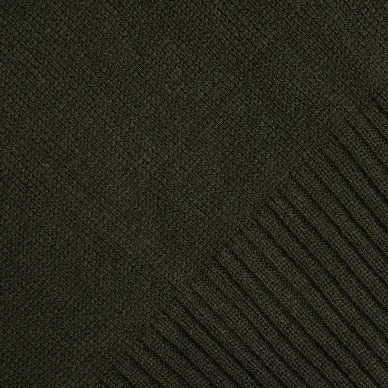 Close-up of a Guinness Bottle Green Crew Neck Jumper with a textured, ribbed pattern by Guinness UK.