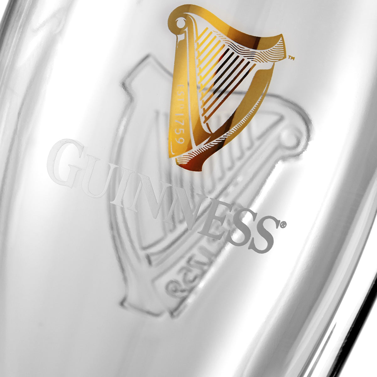 A close up of a Guinness UK 2 Pack pint glass.