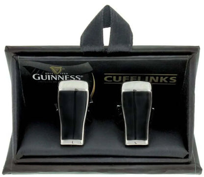 Experience the iconic Irish flair with the Guinness Cufflinks Pint Design - Pearl & Silver, featuring a unique 3D pint shape. These cufflinks from Guinness Webstore UK come in a sophisticated black box, elegantly inscribed with "Cufflinks" inside.